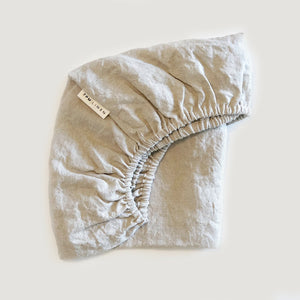 COT SIZE NATURAL FITTED SHEET